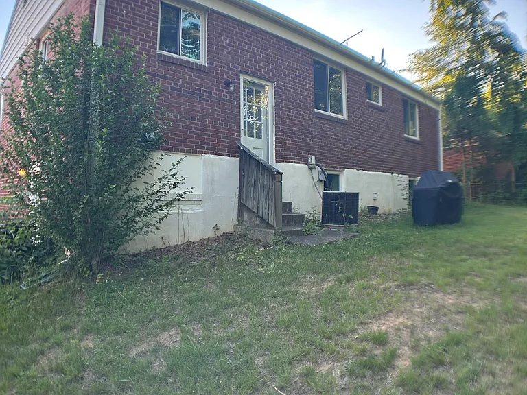 Split level entrance to both kitchen and lower level.