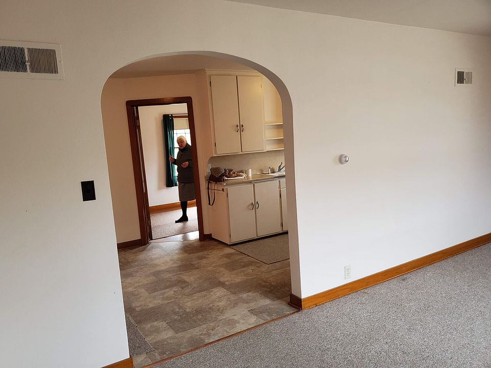 view of living room looking towards kitchen and bedroom