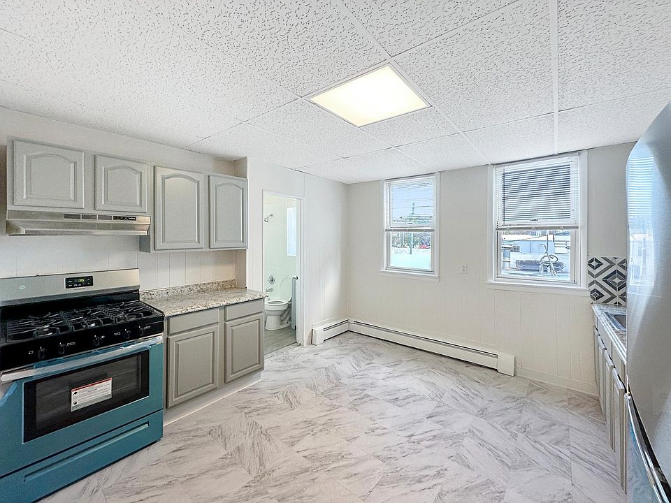 Beautifully renovated kitchen complete with BRAND NEW stainless steel appliances.
