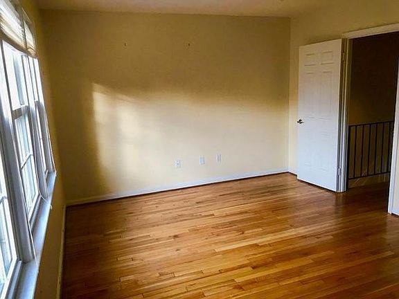 Large, sunny bedroom upstairs