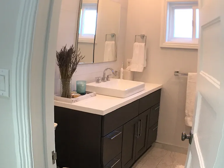 Remodeled full bath with custom tile