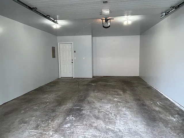 Newly finished 22 X 20 garage has loads of space for any vehicle with space left over for storage, workspace.