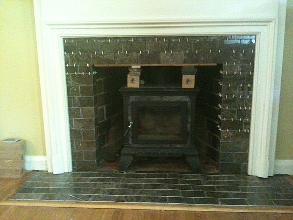 Upgraded Tiled Fireplace, Mantle and Wood Burning Fireplace
