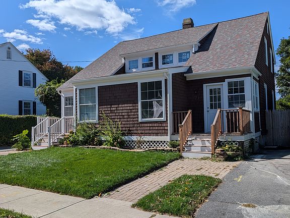 #73 right side property with driveway, pictured.