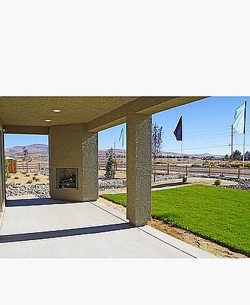 Covered patio and fireplace