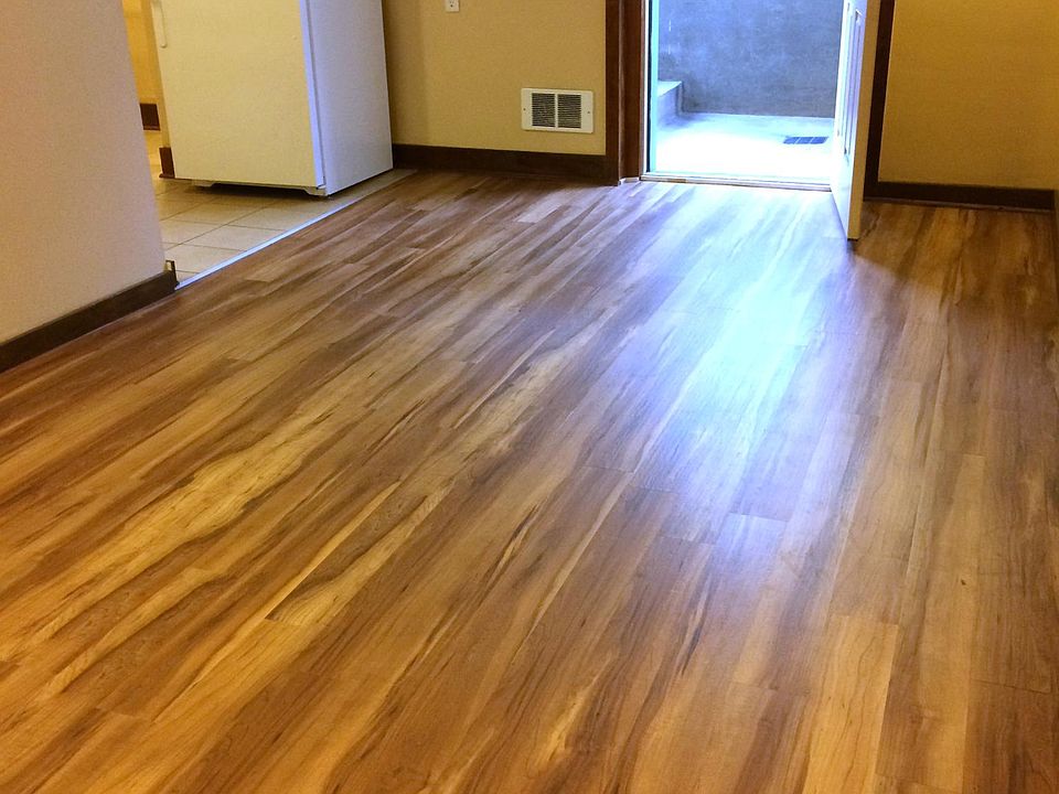 Apartment entry goes straight into the living room. (Photo was taken while standing in the living room in front of the door to Bedroom 1. The kitchen is shown in the left of the photo.)