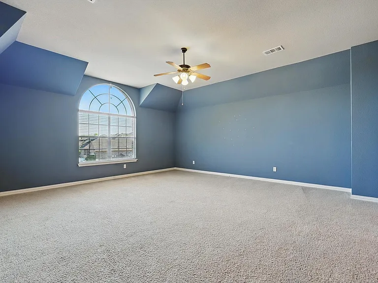 Upstairs, you'll find a massive second-floor family or game room_an ideal space for movie nights, playtime, or relaxing with loved ones. Complete with an attached full bath, it offers added convenience and flexibility for guests or everyday living