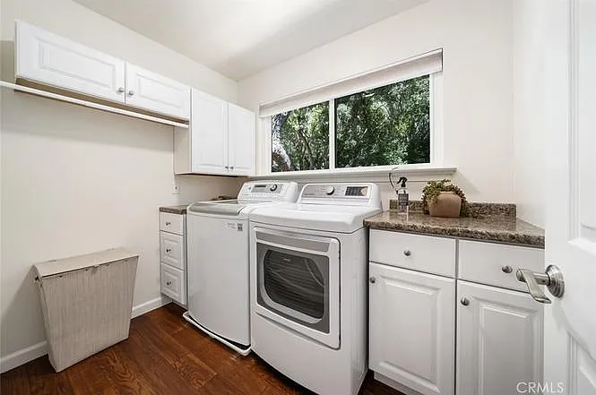 Laundry room - washer, dryer, window, view