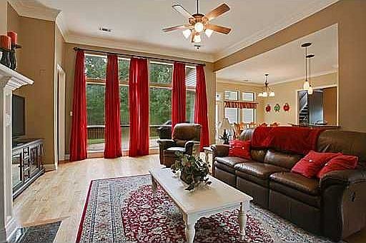 Wall of Windows in the Den provide lots of natural light.