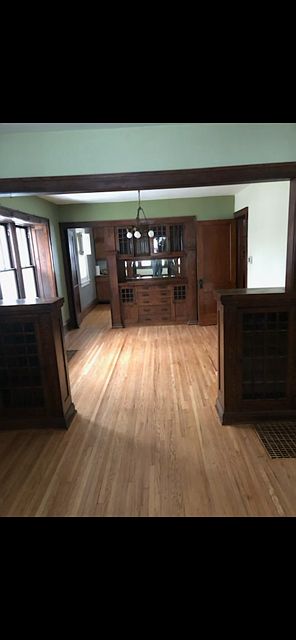 Living/dining area with maximum flow and natural ww built-ins.