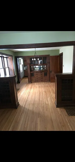 Living/dining area with maximum flow and natural ww built-ins.