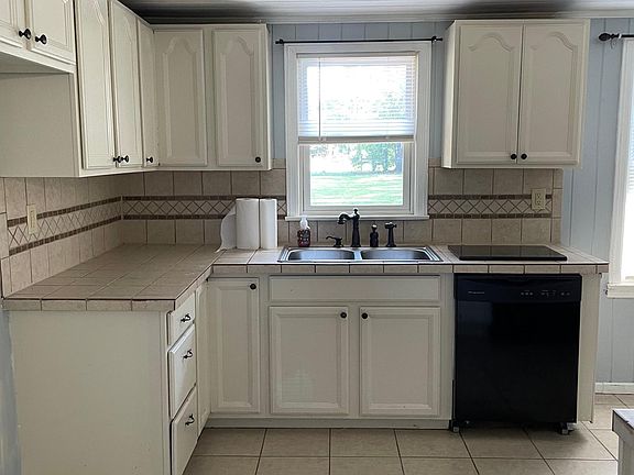 Kitchen Renter can furnish Ref or one is supplied. Also includes dishwasher.microwave plus an open dining room all in one. Adjacent to the kitchen, is the interior laundry room with your washer dryer hookup.