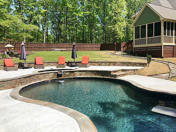 Fenced yard with pool & spa