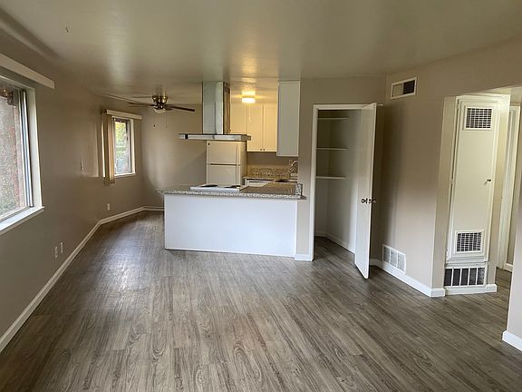 Upgraded flooring- spacious front room for entertaining or a quiet evening in. Great space, eat in kitchen design with beautiful fan. Wood plank design. Two bedrooms, extra hall linen closets for all your needs. Office hours Mon-Fri. 10:30am-5:00pm.