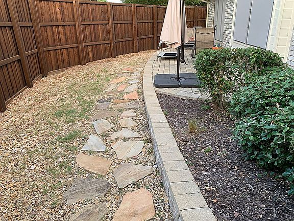 Rock path to stone patio