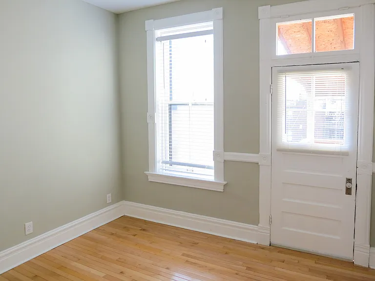 Bedroom fits King bed easily. Private access to balcony
