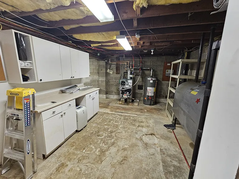 Basement - Mechanical Room
There is working area with storage, and also the Furnace, Boiler and the Oil Tank