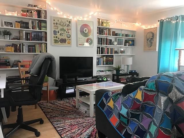 Huge living room/office space view 1 with built-in bookshelves