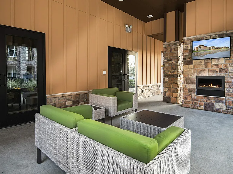 Enjoy the warmth of our stone fireplace and modern seating.