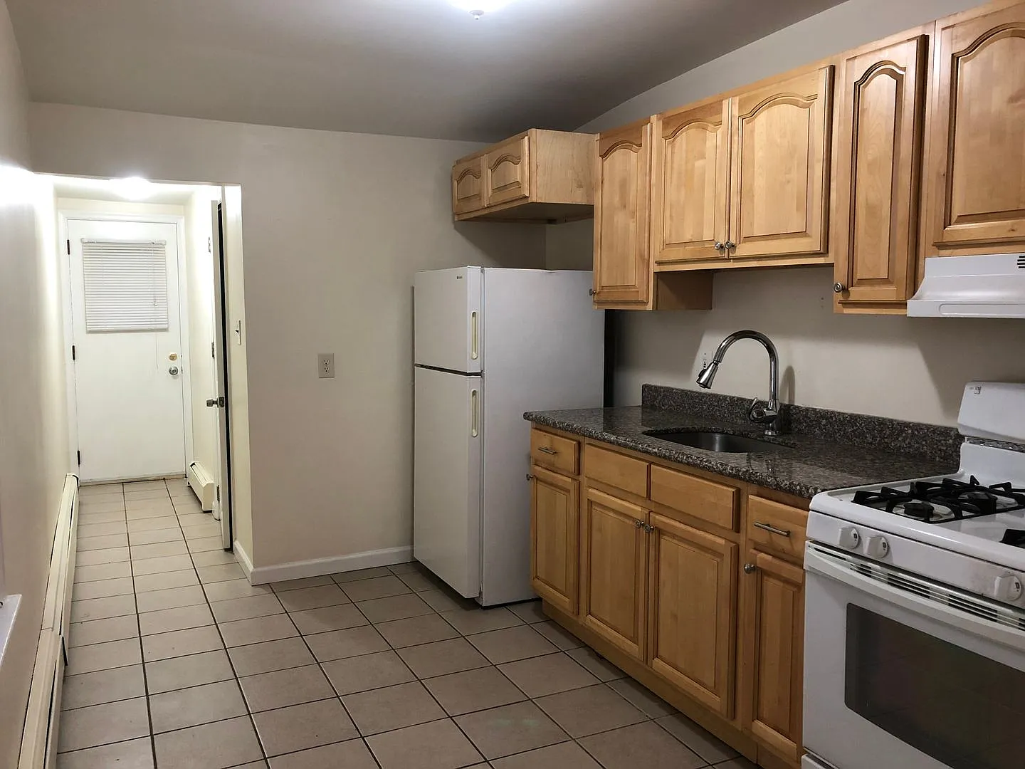 Great Home! Wood Flooring! Updated Kitchen! Wood Cabinets! Granite Counters! Great Living Space! ... — Photo 4