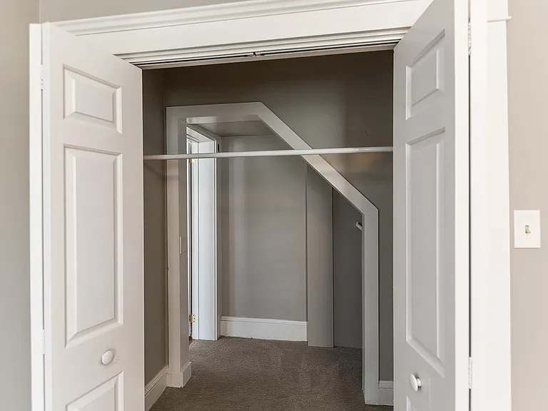 Walk-in closet for bedroom 1.