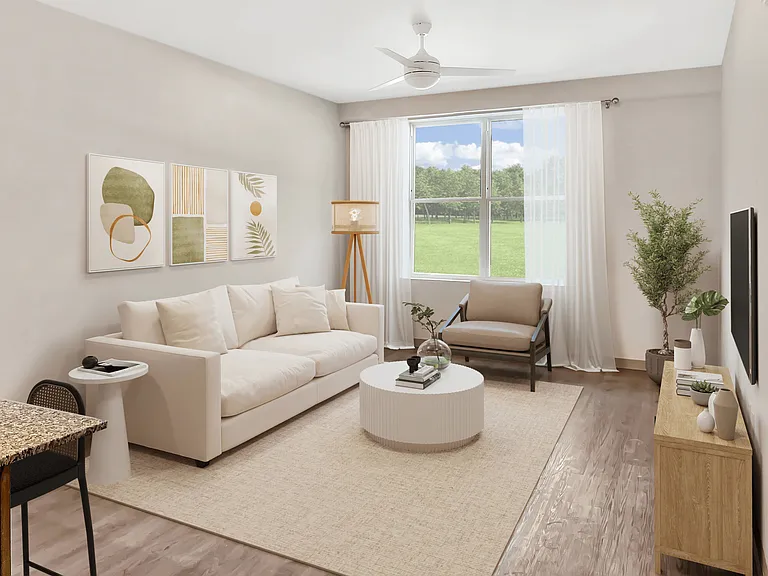 Spacious Living Room with Ceiling Fan and Lots of Natural Lighting