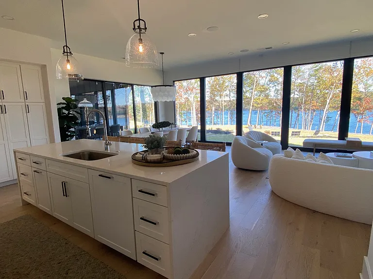 Kitchen to living room with full window view of Lake Arrowhead.