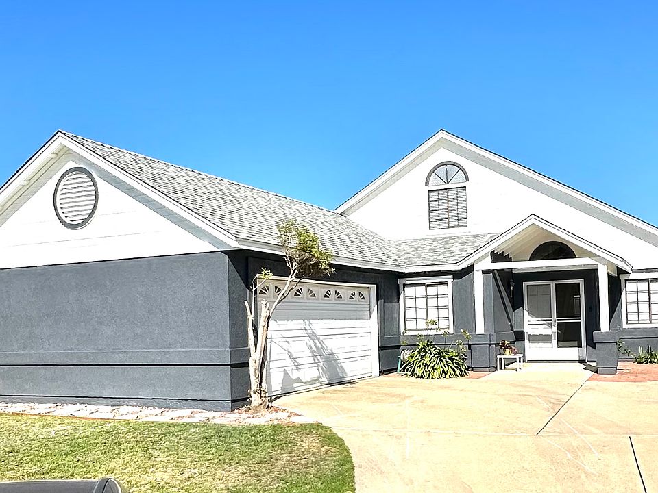 Front of the house. Studio located in the back of the house.