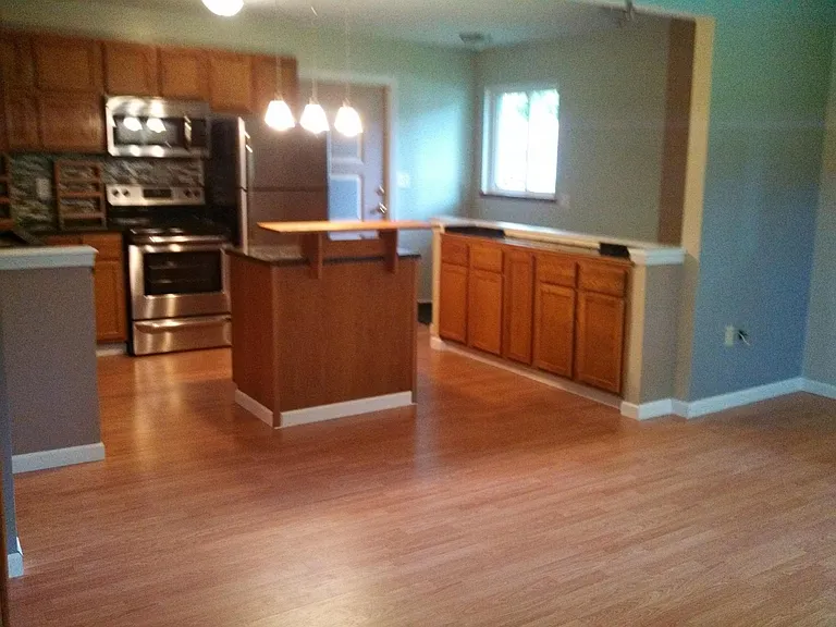 Open kitchen and living room. Lots of storage.