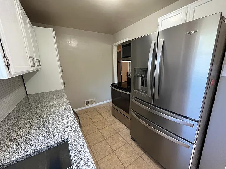 4745 N Raleigh St — Photo 7