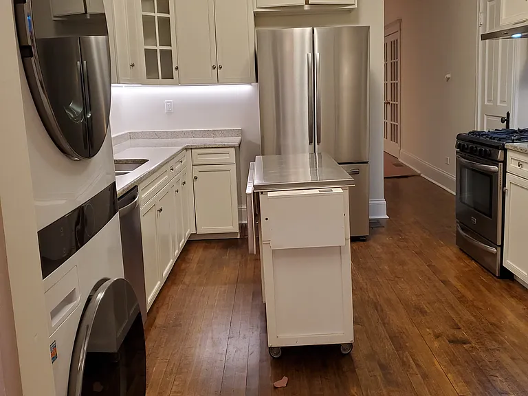 Renovated kitchen with granite counter tops, SS appliances, island and NEW LG WASHER/DRYER