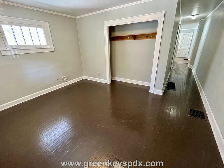 Living room with view down hallway
