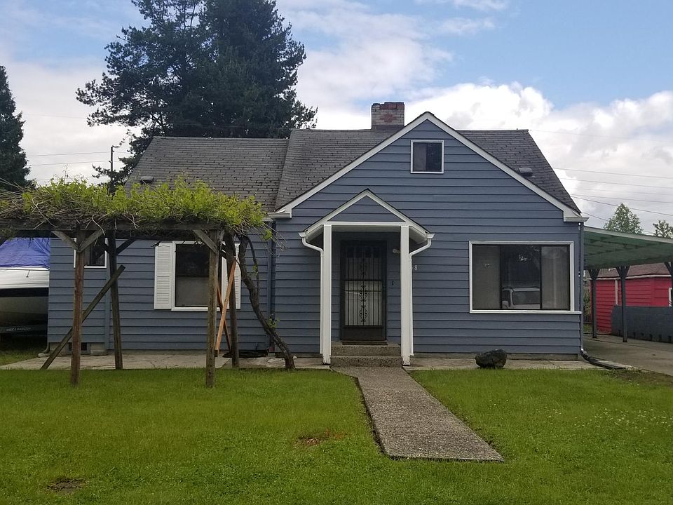 Front Yard with Carport and RV Parking.