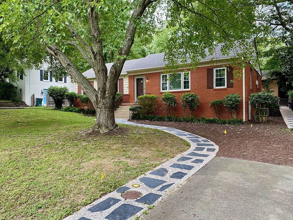 Spacious front yard with two-car driveway.