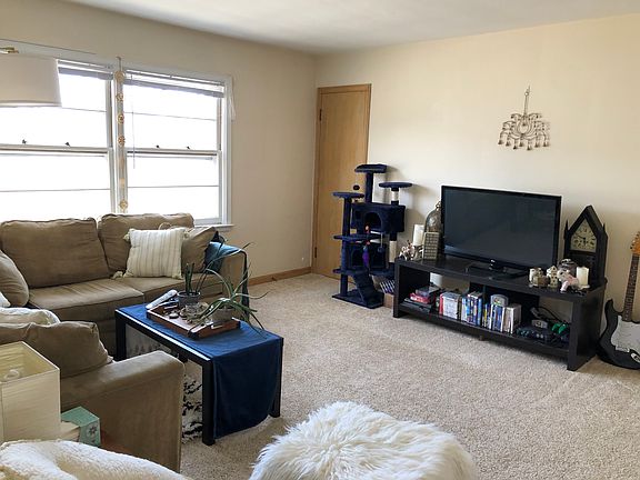 Living room with big windows and closet