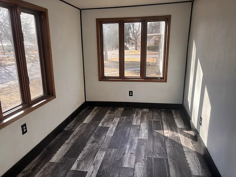 Heated front porch with lots of natural light!