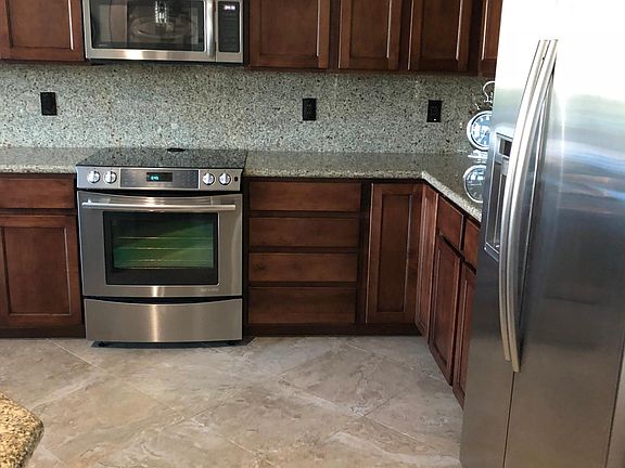 Food Pantry to the right of the refrigerator