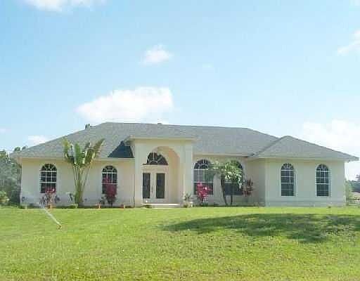 4 Bedroom, 2 bath, 2 car garage, pool home on 1.33 acre lot 