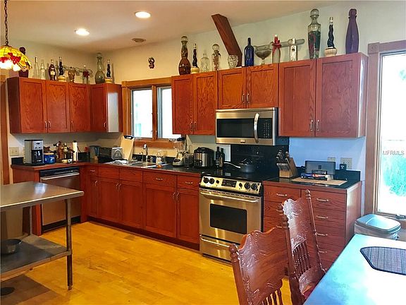 4th image of 6297 Lake Charm Cir