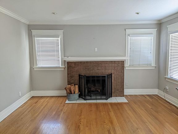 Open and airy living room space as you enter the front door.