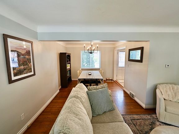 Dining area and open entry to kitchen and back door.