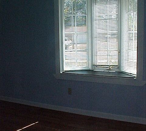 blue bedroom with window seat