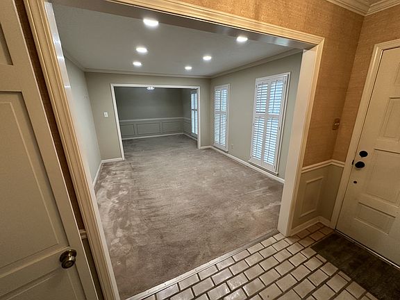 From entry hall into formal living room and dining room