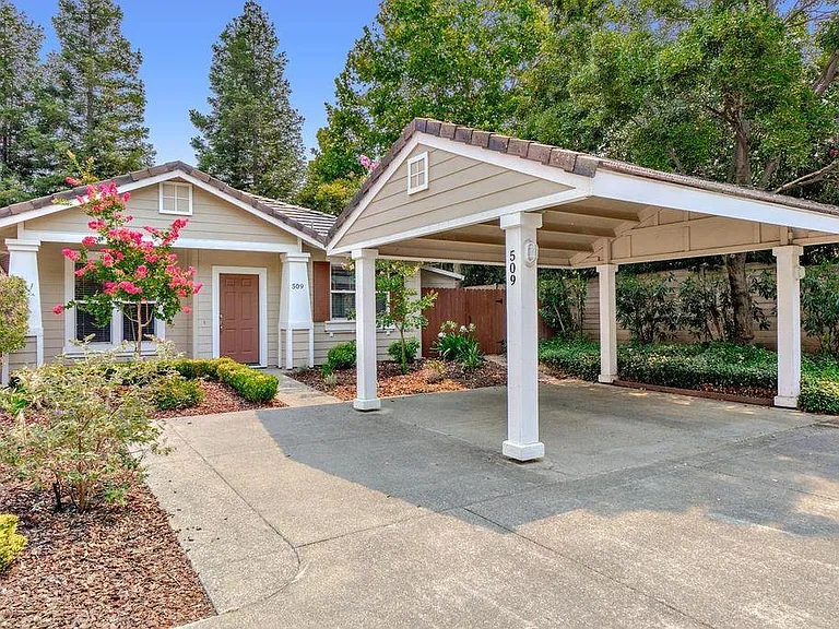 Front of house with carport