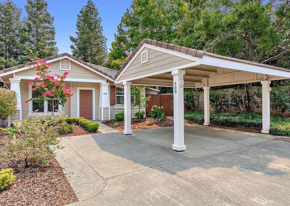 Front of house with carport