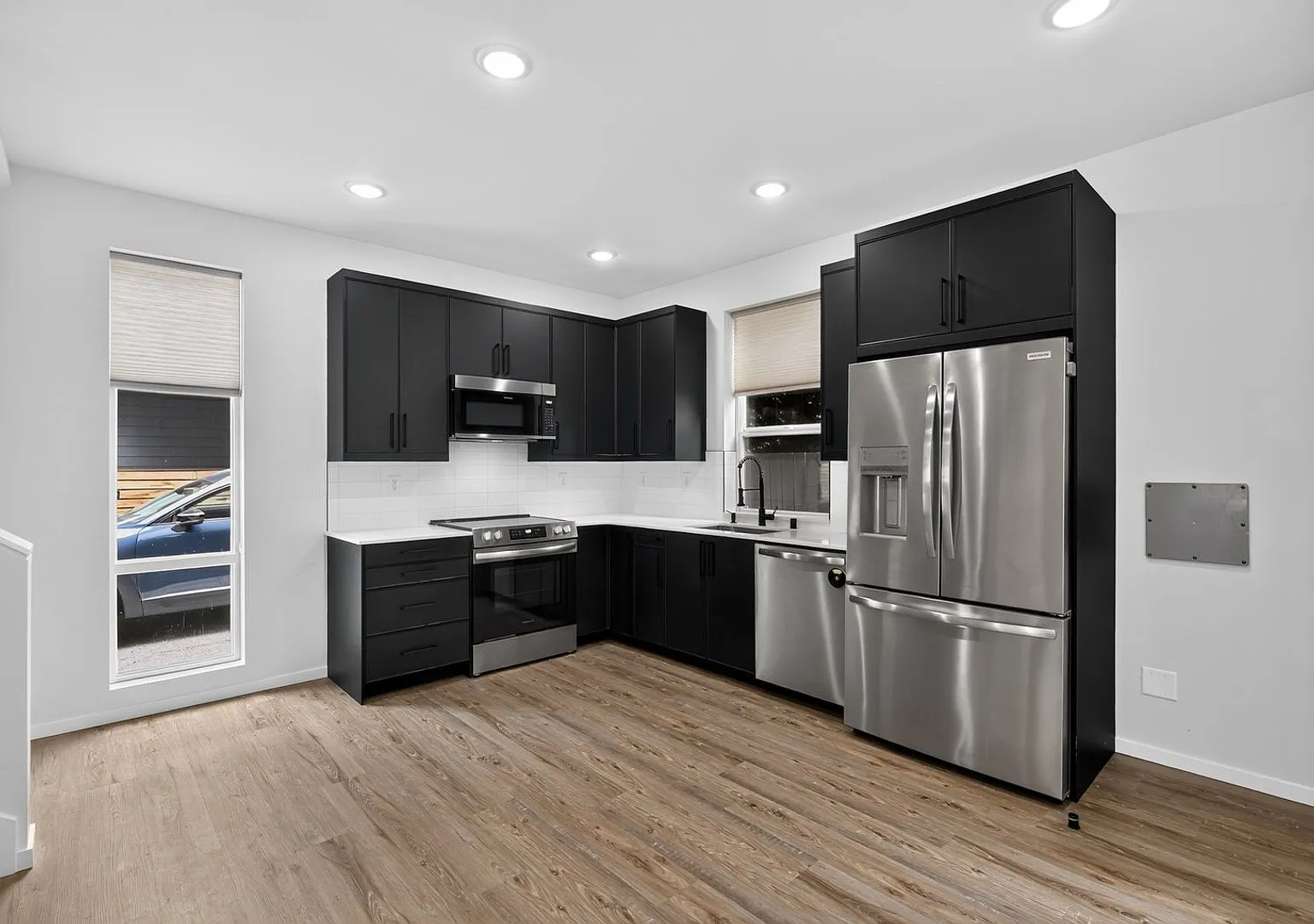 Modern 1-Year-Old Home in Central District w/ Private Rooftop Deck, Lower-Level Private Suite & M... — Photo 2