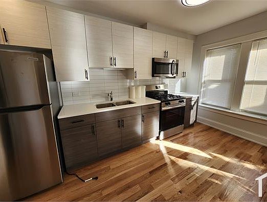 1st image of 7557 S Eberhart Ave #1