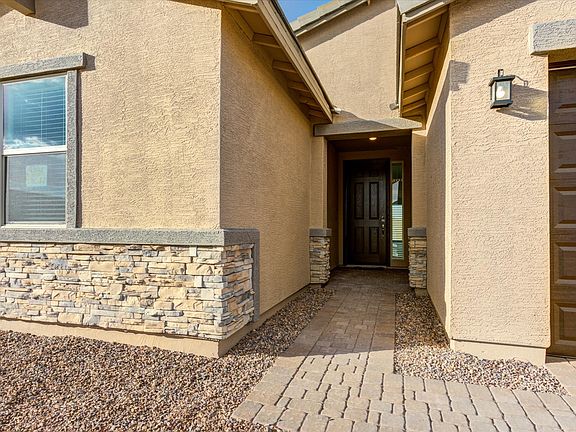 Cool off from the sun in the Lark front entryway.