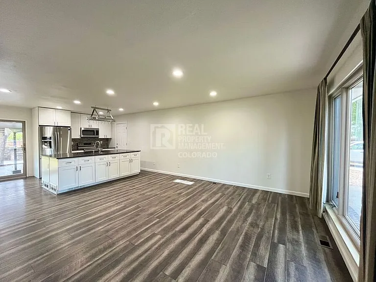9387 W Eastman Pl — Photo 2