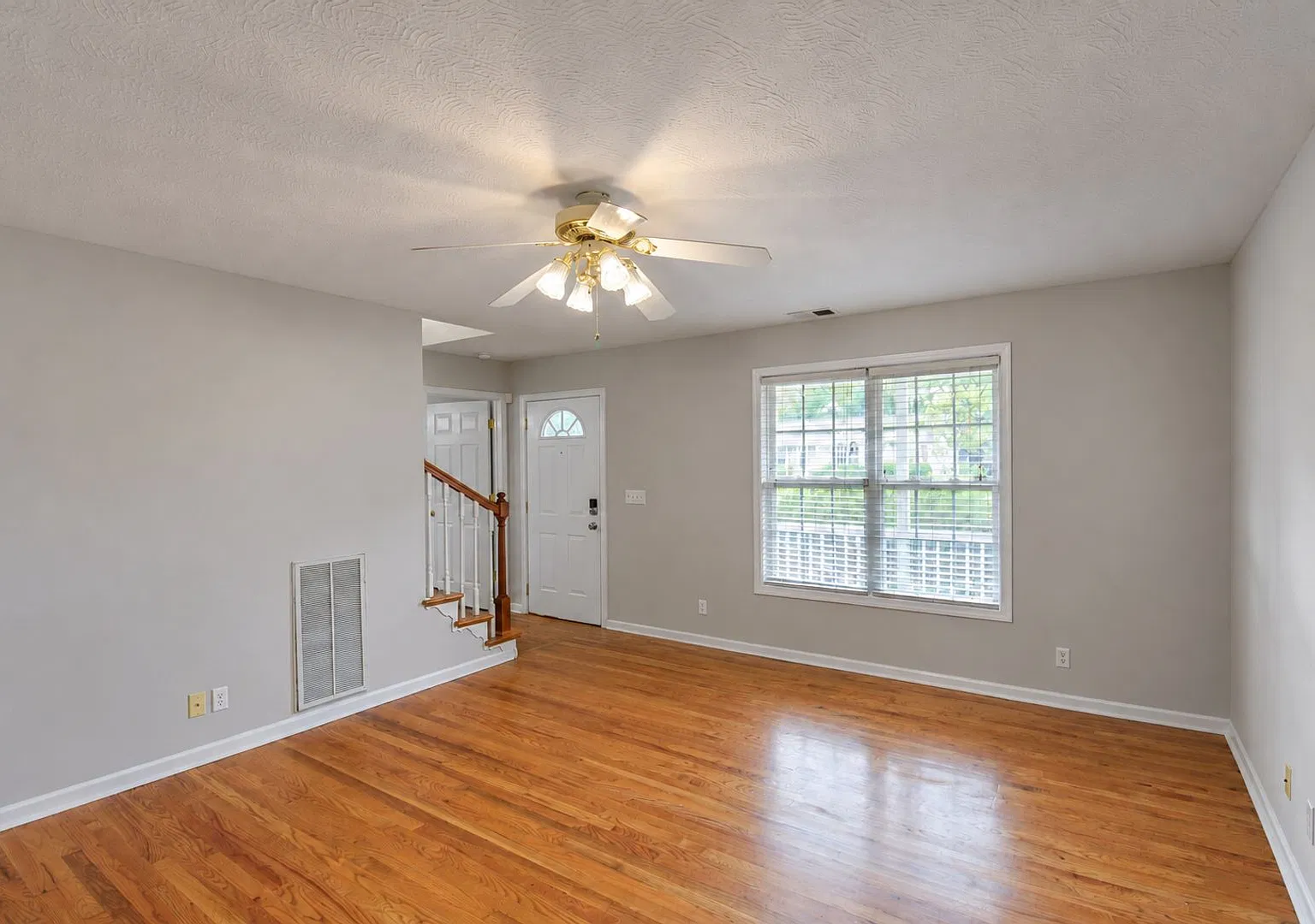 3-Bedroom Home with Main-Level Primary Suite, Sunroom & 2-Car Garage — Photo 4